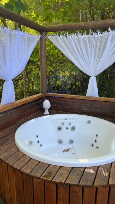Foto 6 de Casa de Condomínio com 3 quartos à venda, 200m2 em Ilhabela - SP