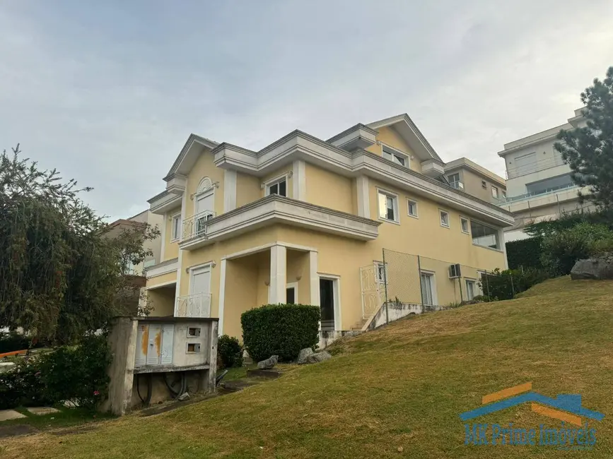Foto 2 de Casa de Condomínio com 4 quartos à venda e para alugar, 385m2 em Centro Comercial Jubran, Barueri - SP