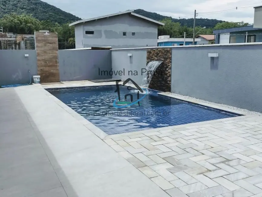 Foto 1 de Casa de Condomínio com 4 quartos à venda, 230m2 em Ubatuba - SP