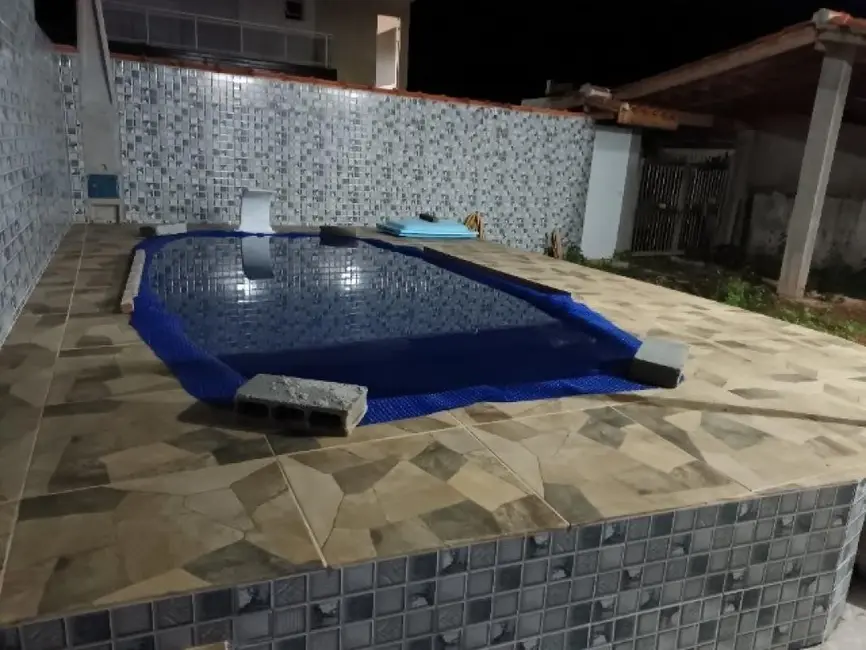 Foto 7 de Casa de Condomínio com 4 quartos à venda, 200m2 em Massaguaçu, Caraguatatuba - SP