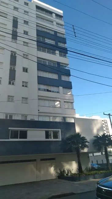 Apartamento com 2 quartos à venda, 60m2 em Capao Da Canoa - RS - imagem 1 Foto 1 de Apartamento com 2 quartos à venda, 60m2 em Capao Da Canoa - RS