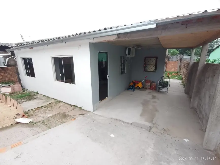 Foto 1 de Casa com 2 quartos à venda, 60m2 em Alegrete - RS