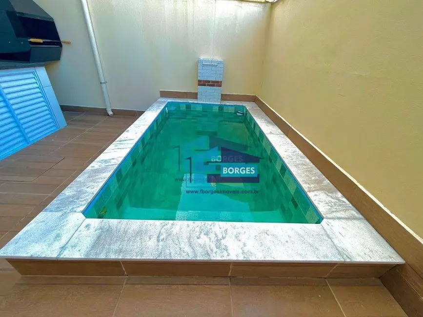 Foto 2 de Casa de Condomínio com 2 quartos à venda, 82m2 em Centro, Mongagua - SP