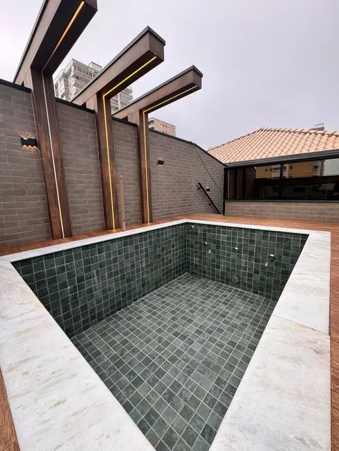 Foto 2 de Casa com 4 quartos à venda, 45m2 em Guilhermina, Praia Grande - SP