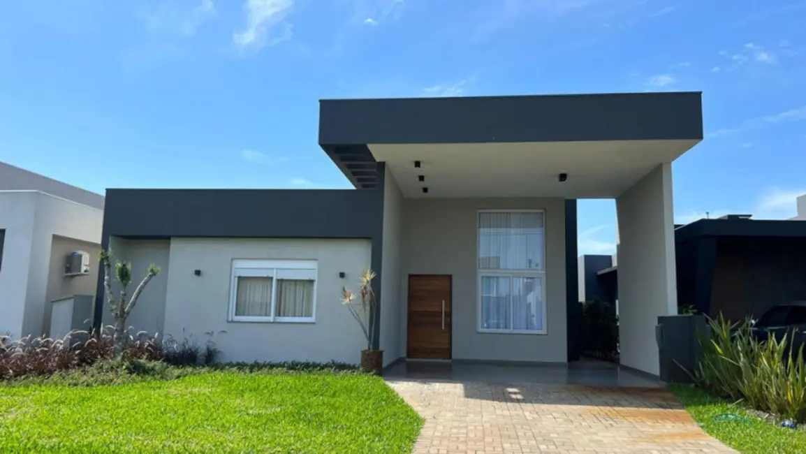 Casa de Condomínio com 4 quartos à venda, 211m2 em Xangri-lá - RS - imagem 1 Foto 1 de Casa de Condomínio com 4 quartos à venda, 211m2 em Xangri-lá - RS