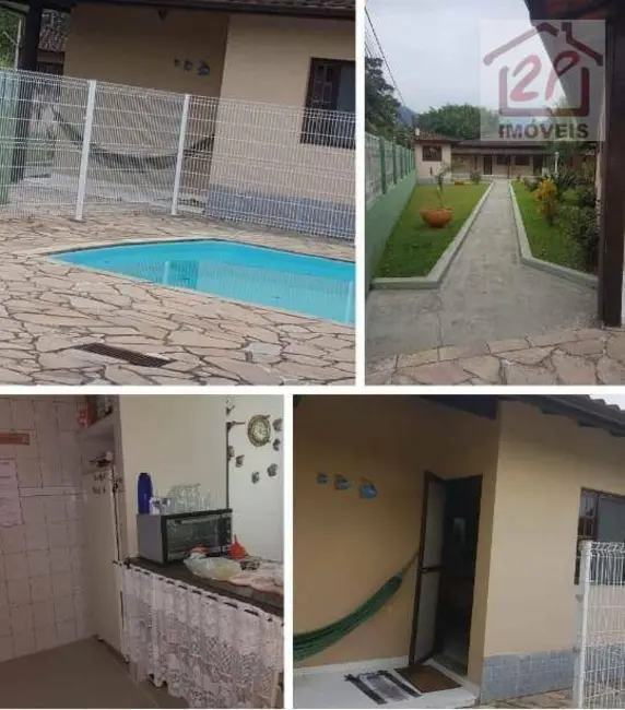 Foto 1 de Casa com 3 quartos à venda, 250m2 em Martim de Sá, Caraguatatuba - SP